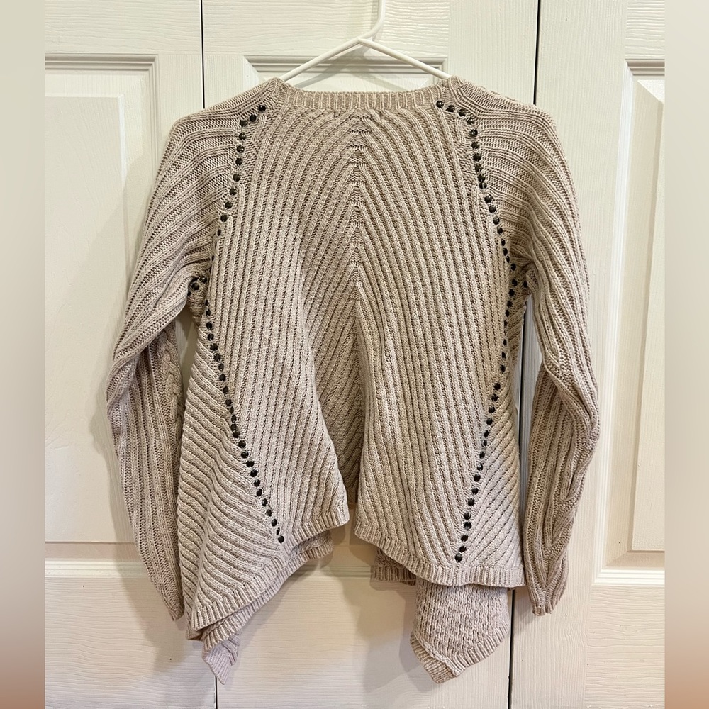 Draping oat-colored cardigan from Alberto Makali